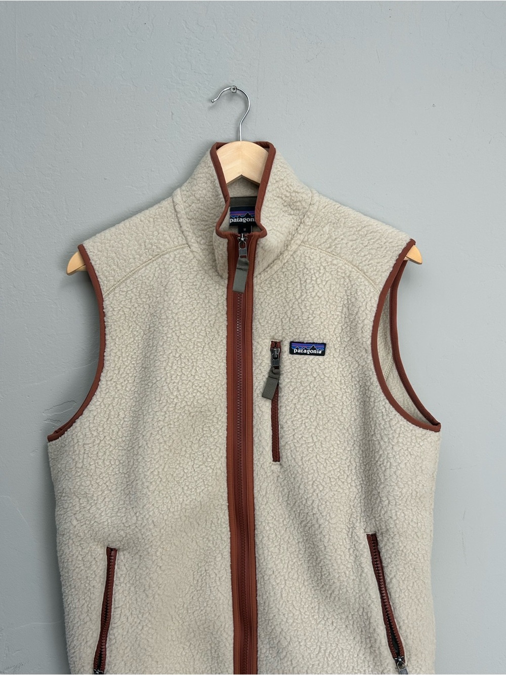 Patagonia Men’s Cream Fleece Vest with Brown Trim